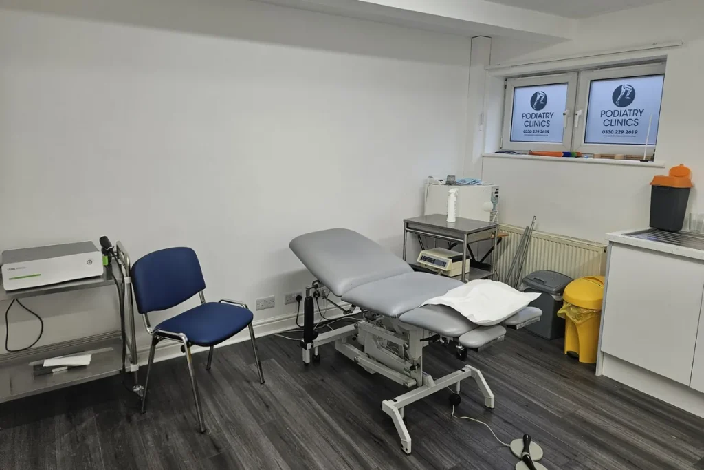 Podiatry treatment room at the Leeds clinic, with treatment couch and clinical equipment
