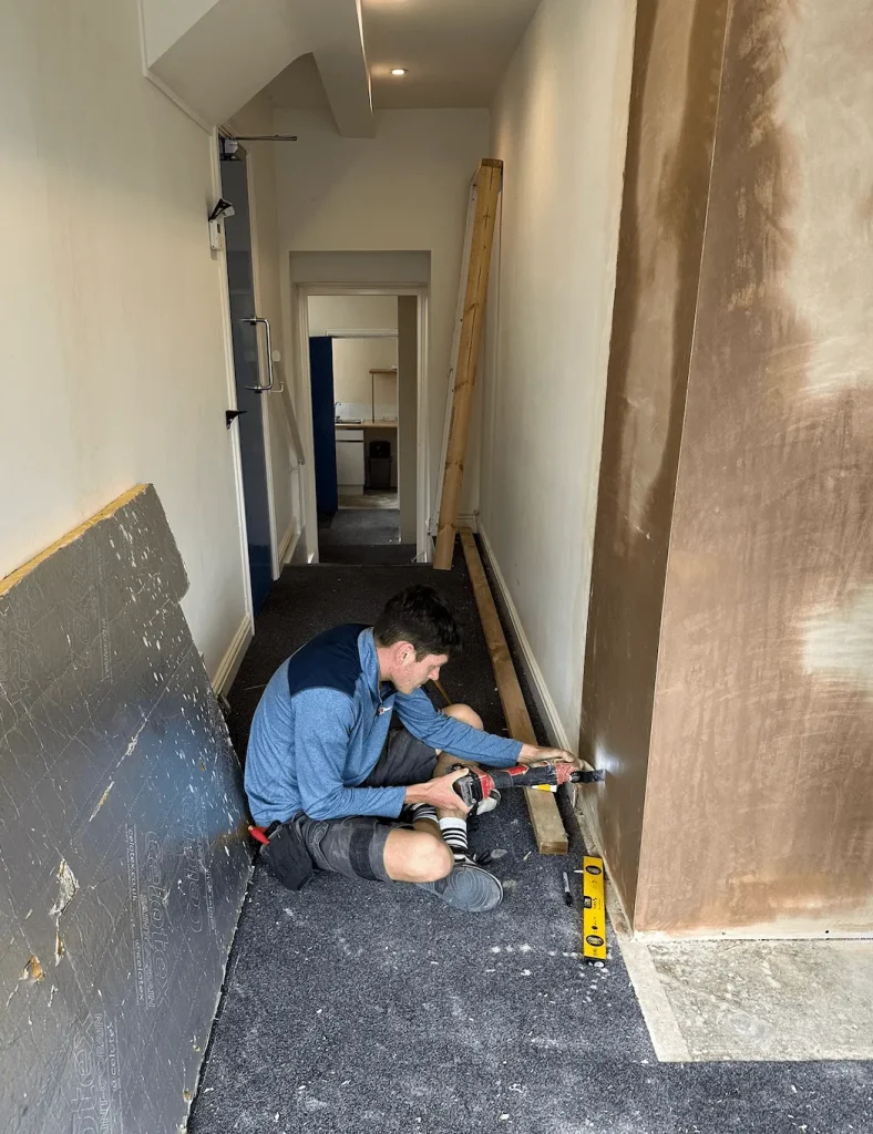 Fitting out the corridor during the refurbishment of the new Leeds clinic
