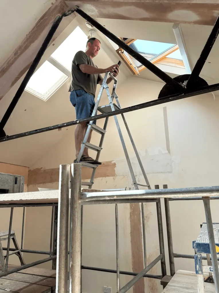 Installing a roof window during the refurbishment of the new Leeds clinic